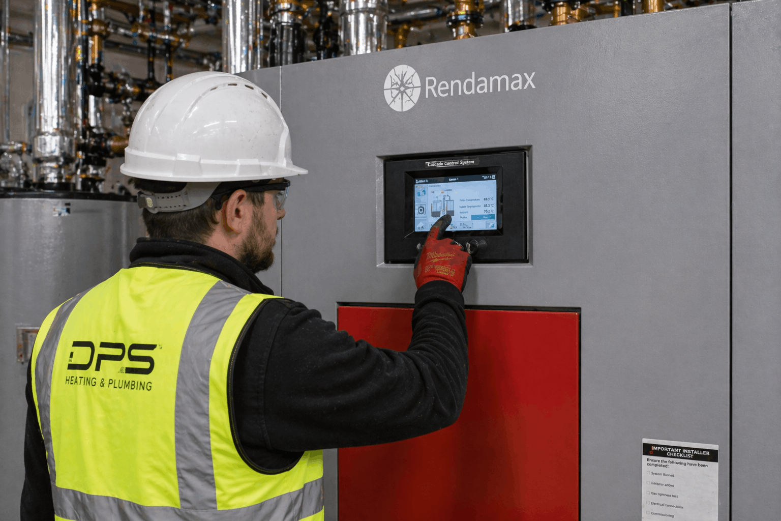 Commercial boiler control panel configuration during installation in Bury St Edmunds business premises