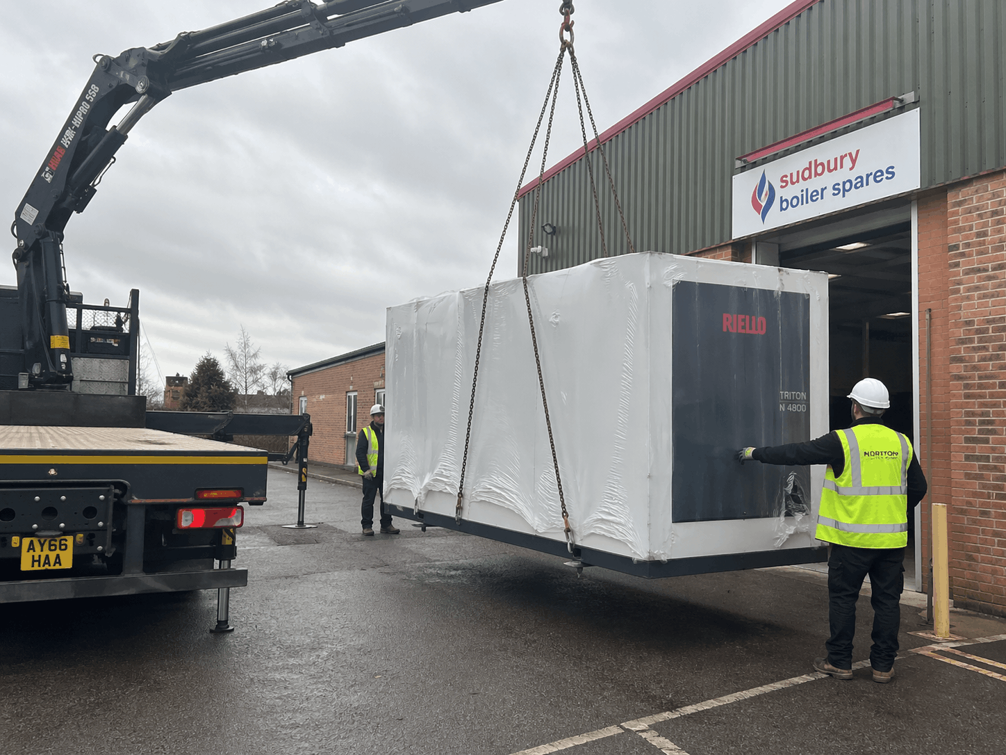 New commercial boiler unit delivery to Sudbury business site ready for professional replacement installation