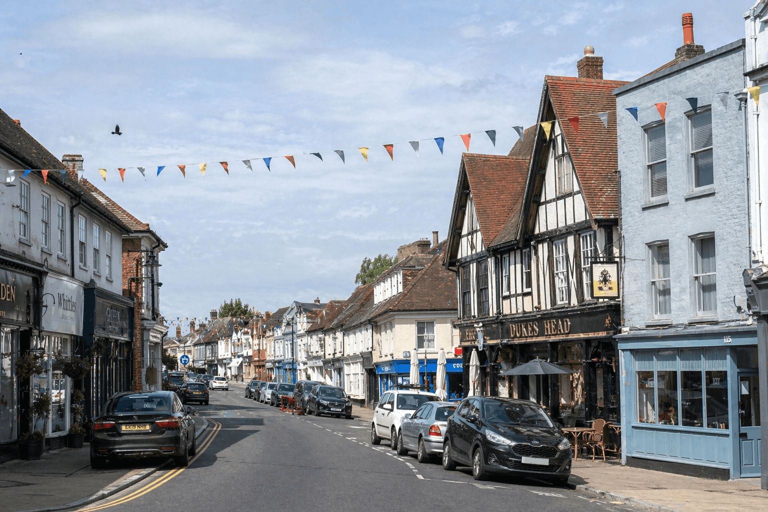 Great Dunmow town centre view showing historic commercial properties served by Anglian PHE Ltd