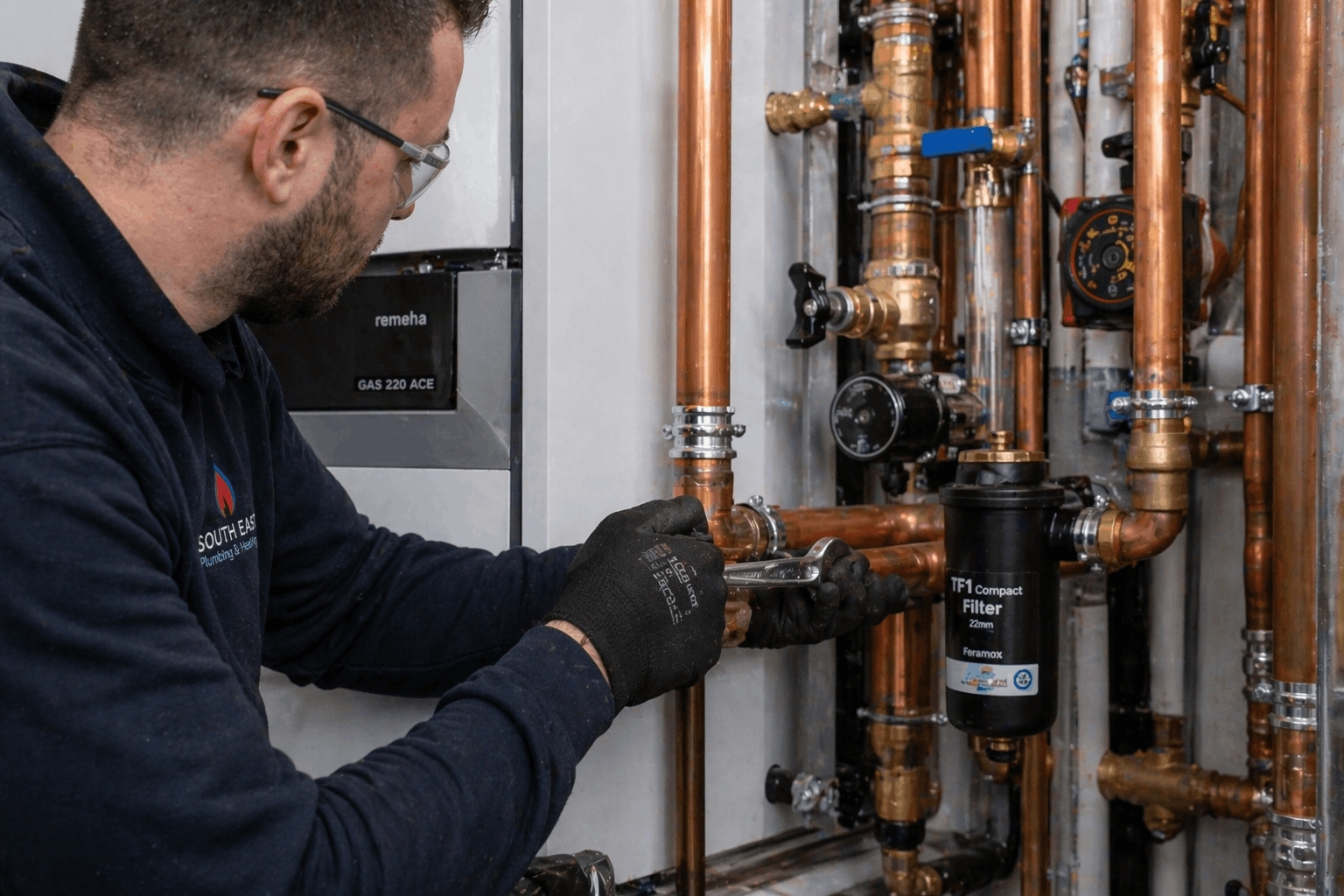 Detailed heating pipe modification work during commercial boiler replacement project in Braintree