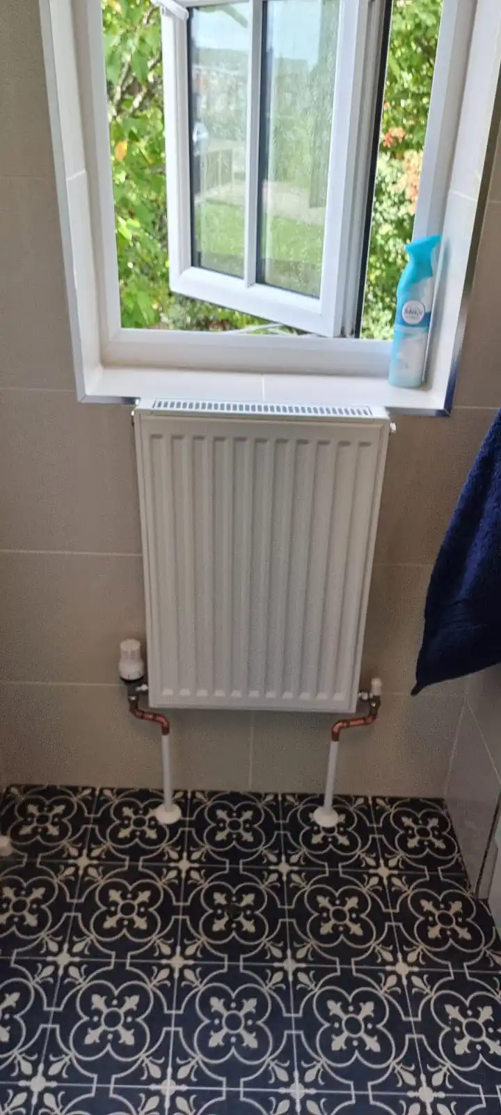 Radiator and heating installation from the Anglian PHE work portfolio
